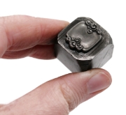 Picture of Impression Die Held by Swirls