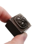 Picture of Impression Die Decorated Pyramid Bead