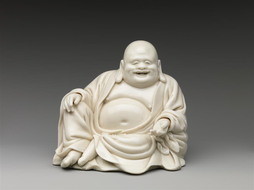 Dehua ware statuette of the Buddhist monk Budai. Qing Dynasty (1644–1911) in China. Digital image courtesy of the Met.