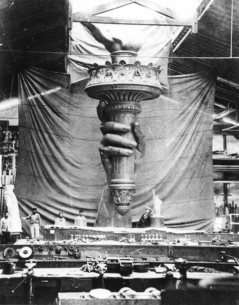 The torch hand of the Statue of Liberty (1881-1884) being constructed in France. Digital image courtesy of the Ellis Island Foundation, Inc.